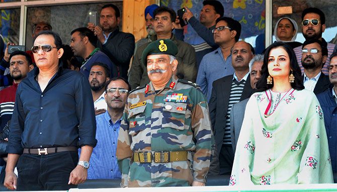 Former India captain Mohammad Azharuddin and actress Dia Mirza at an army event in Kashmir