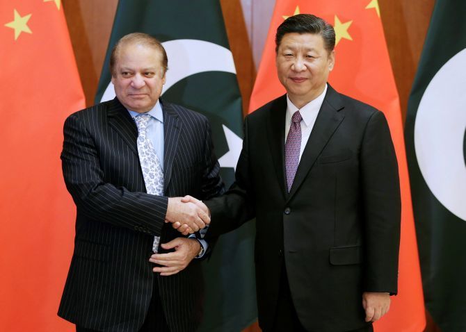 Pakistan Prime Minister Nawaz Sharif, left, with Chinese President Xi Jinping ahead of the Belt and Road Forum in Beijing. Photograph: Jason Lee/Reuters