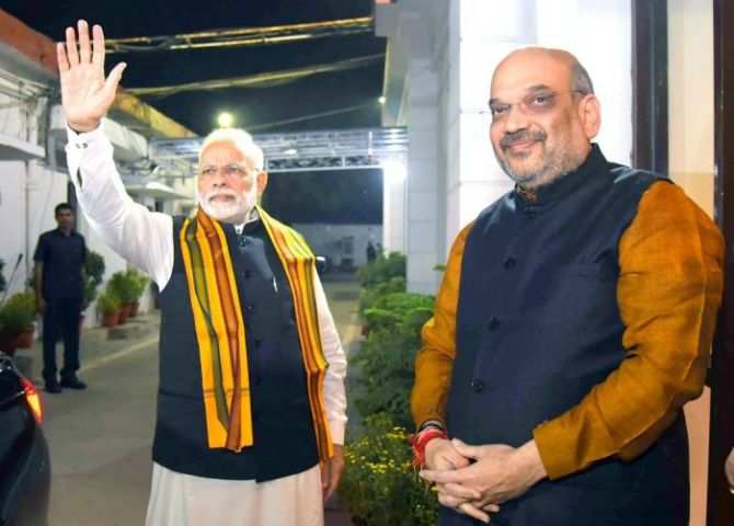 Prime Minister Narendra D Modi, left, and Bharatiya Janata Party President Amit A Shah. Photograph: Kind courtesy @BJP4India/Twitter