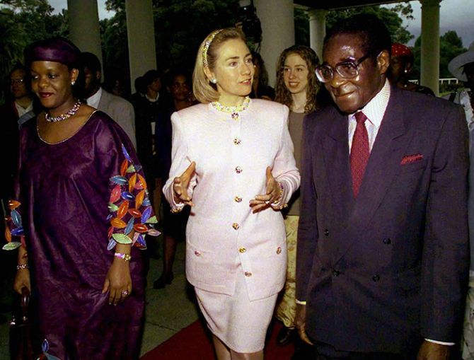 Hillary and Chelsea Clinton with Robert and Grace Mugabe