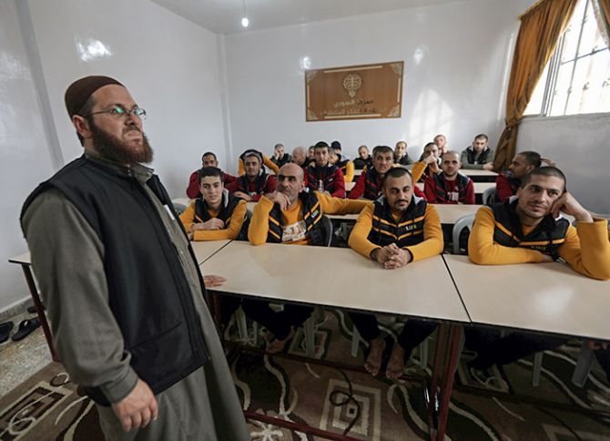 Former Islamic State members in a classroom at the Syrian Centre for Combating Extremist Ideology in the town of Marea in northern Aleppo, Syria, November 2, 2017. Photograph: Khalil Ashawi/Reuters
