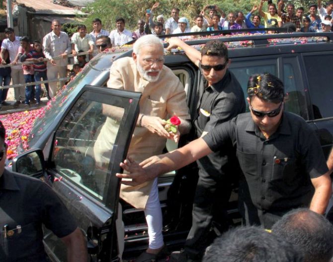 Prime Minister Narendra D Modi during a roadshow in Vadnagar, Gujarat, October 8, 2017. Photograph: PTI Photo