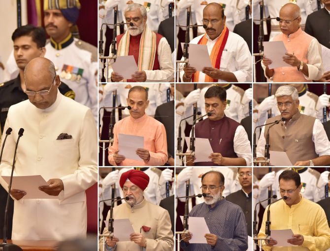 President Ram Nath Kovind administers the oath of office to the ministers of state