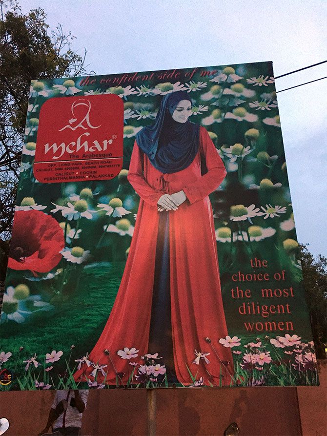 A billboard with a burqa adverstisement in Kozhikode