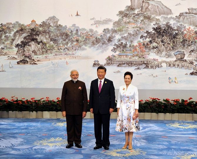 Prime Minister Narendra D Modi with Chinese President Xi Jinping and his wife Peng Liyuan at the welcome banquet for BRICS leaders in Xiamen, China, September 4, 2017. Photograph: Press Information Bureau