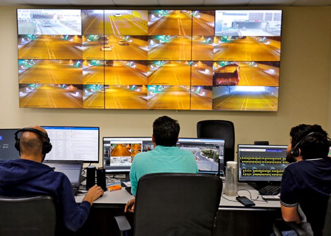 Workers monitor screens connected to cameras set up in and outside the Chenani-Nashri Tunnel, Asia's longest bi-directional tunnel, on the Jammu-Srinagar National Highway at Chenani, northeast of Jammu April 3, 2017. Photo: Mukesh Gupta/Reuters