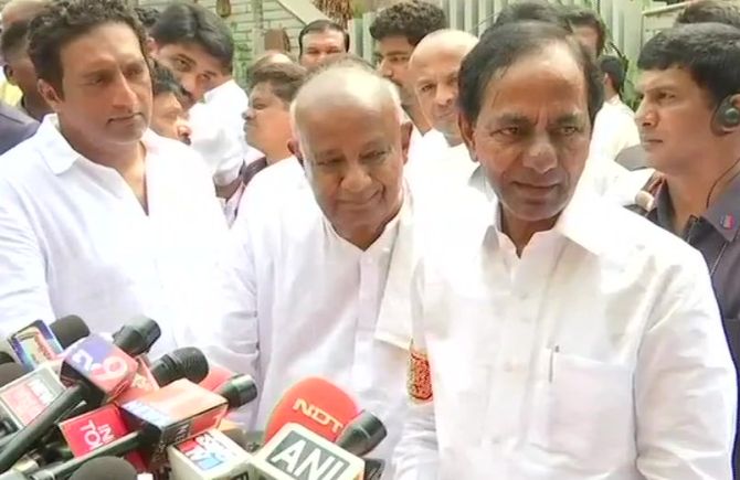 Former prime minister H D Deve Gowda, centre, with Telangana Chief Minister K Chandrasekhar Rao, right. Photograph: ANI