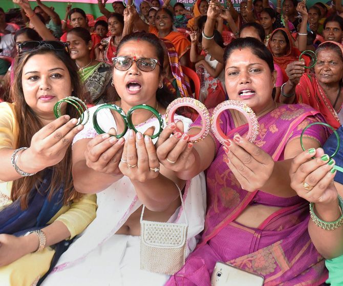 Women offer bangles during a protest against the Muzaffarpur shelter home scandal. Photograph: PTI Photo