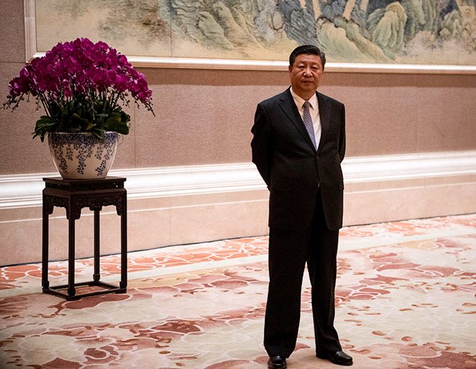China's supreme leader Xi Jinping waits for Papua New Guinea Prime Minister Peter O'Neill at the Diaoyutai state guesthouse in Beijing, June 21, 2018. Photograph: Fred Dufour/Reuters
