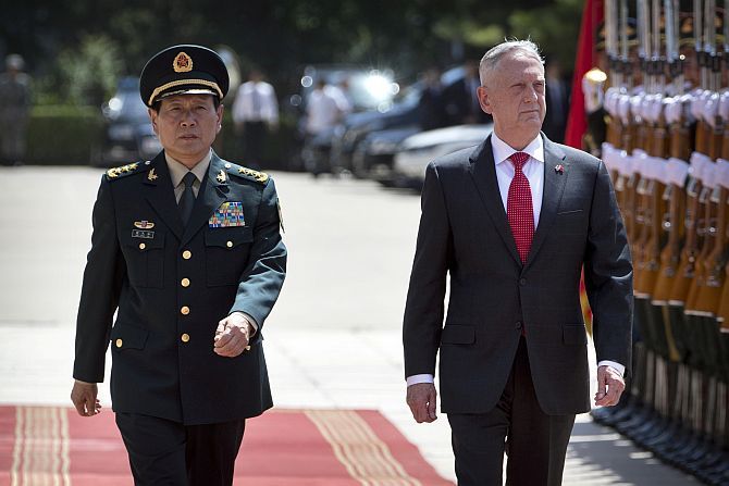 China's Defence Minister Wei Fenghe and United States Defense Secretary General Jim Mattis review an honour guard in Beijing, June 27, 2018. Photograph: Mark Schiefelbein/Reuters