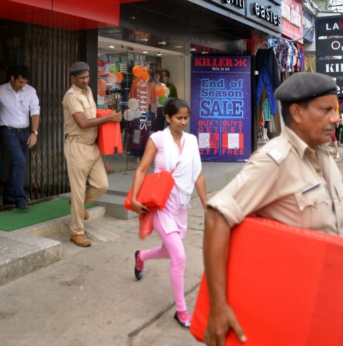 Officials conduct a raid at the residential hotel of Brajesh Thakur, the prime accused in the Muzaffarpur shelter home sex scandal, in Patna. Photograph: PTI Photo