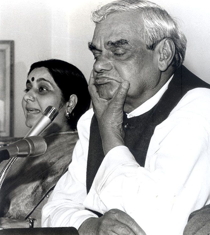 Atal Bihari Vajpayee in deep thought with Sushma Swaraj at a press conference