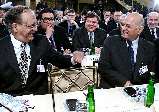Brajesh Mishra, then India's national security adviser, and Abdul Sattar, then Pakistan's foreign minister, share a joke at the Munich conference on security policy, February 3, 2002. Photograph: Tobias Schwarz/Reuters
