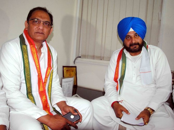 Navjot Singh Sidhu with Mohammad Azharuddin during the Telangana assembly election campaign. Photograph: SnapsIndia