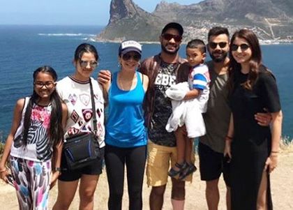 Dhawan, Kohli and family