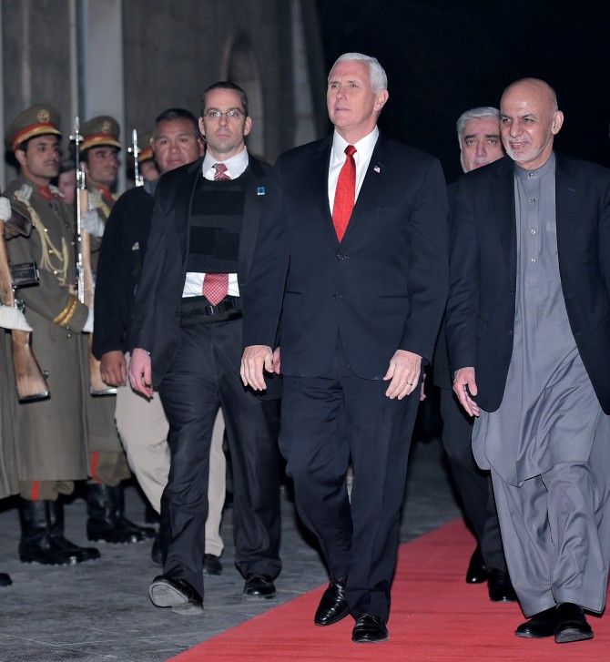 US Vice President Mike Pence, left, inspects an honour guard with Afghanistan President Ashraf Ghani, second from right, and Afghan CEO Dr Abdullah Abdullah, third from right, at the presidential palace in Kabul, December 21, 2017. Photograph: Mandel Ngan/Reuters