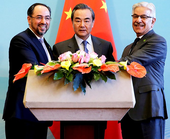 Afghan Foreign Minister Salahuddin Rabbani, Chinese Foreign Minister Wang Yi and Pakistan Foreign Minister Khawaja Asif at a news conference after the 1st China-Afghanistan-Pakistan foreign ministers' dialogue in Beijing, December 26, 2017. Photograph: Jason Lee/Reuters