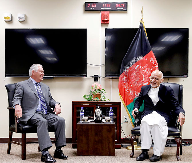 US Secretary of State Rex Tillerson, left, with Afghan President Ashraf Ghani at a meeting at Bagram air field, Afghanistan, October 23, 2017. Photograph:Alex Brandon/Pool/Reuters