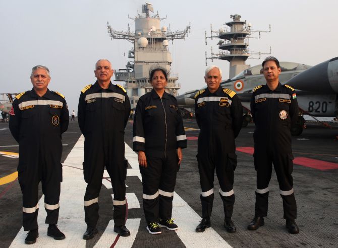 Defence Minister Nirmala Sitharaman with Naval officers on INS Vikramaditya