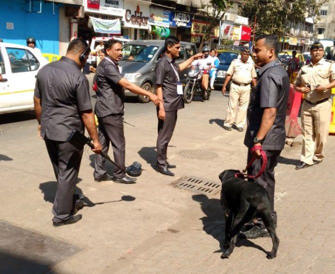 Bomb detection squad and the Labradors scour Hormusji Street. Photograph: Vaihayasi Pande Daniel/Rediff.com