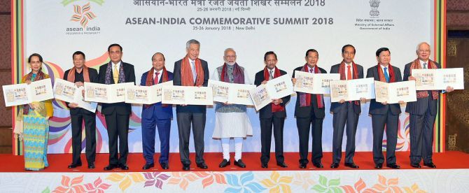 Prime Minister Narendra D Modi with ASEAN heads of State/governments and the ASEAN secretary-general release postal stamps to commemorate the silver jubilee of the India-ASEAN partnership at the ASEAN India Commemorative Summit. Photograph: PTI Photo
