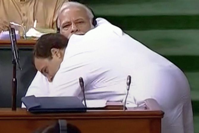 Congress President Rahul Gandhi hugs Prime Minister Narendra Damodardas Modi during the no-trust debate in the Lok Sabha, July 20, 2018. Photograph: PTI Photo
