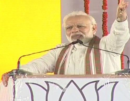 PM slams Oppn, refers to Rahul's 'unwanted hug' at UP rally