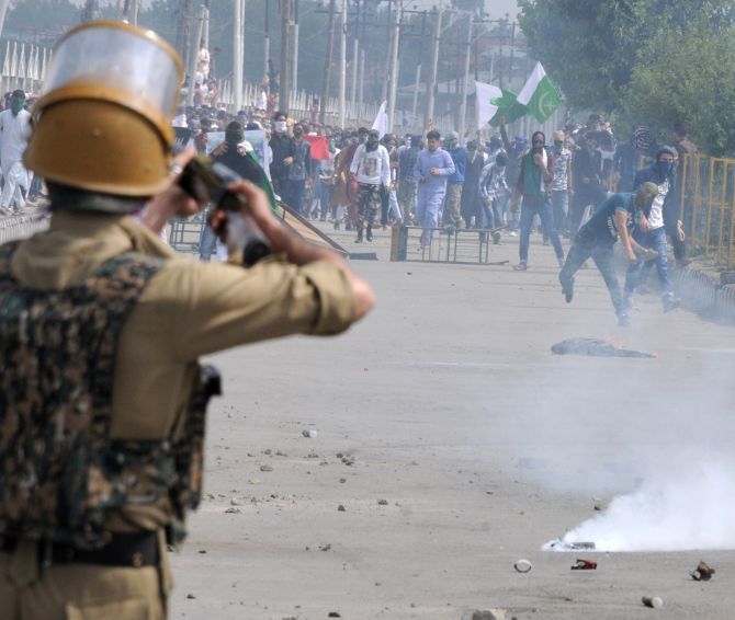 Clashes erupt in Srinagar between locals and security forces following Eid prayers, June 16, 2018. Photograph: Umar Ganie for Rediff.com