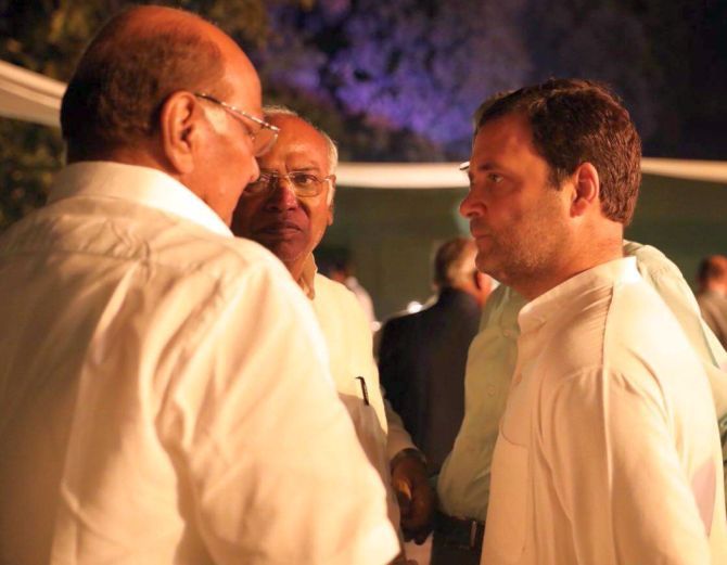Sharad Pawar, Mallikarjun Kharge and Rahul Gandhi at Sonia Gandhi's dinner on March 13, 2018 for Opposition leaders. Photograph: Kind courtesy @INCIndia/Twitter