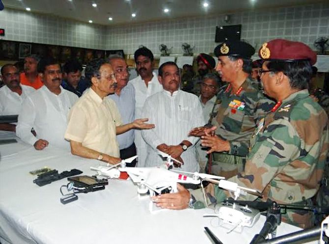 Major General B C Khanduri (retd), left in yellow bush shirt, chairman, parliamentary standing committee on defence, interacts with army officers during the committee's visit to the Northern Command Headquarters in Udhampur, Jammu and Kashmir, May 30, 2015.