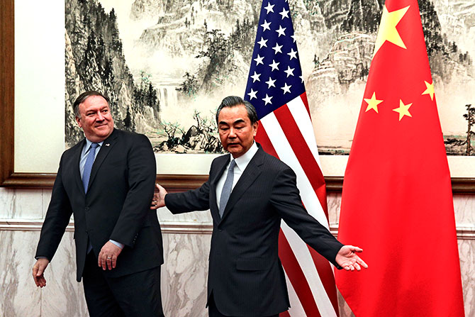 Chinese State Councilor and Foreign Minister Wang Yi, right, with United States Secretary of State Mike Pompeo at the Diaoyutai state guesthouse in Beijing, October 8, 2018. Photograph: Andy Wong/Pool/Reuters