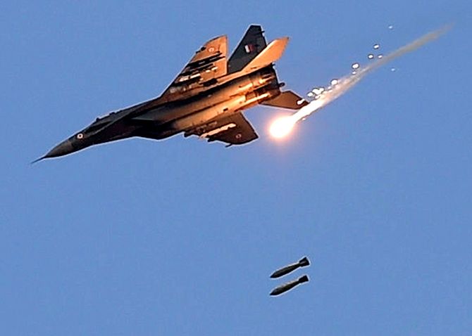 An Indian Air Force MiG 29 releases bombs during Vayu Shakti 2019 ,February 16, 2019. Photograph: Manvender Vashist/PTI Photo