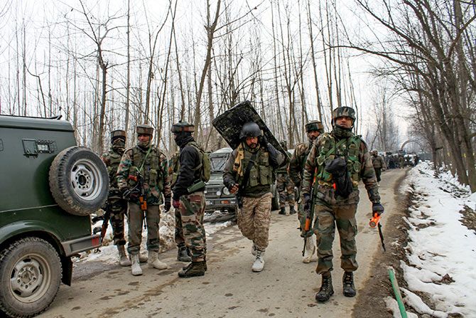 Indian Army soldiers at an encounter in which two soldiers were killed in the Ratnipora area, Pulwama, south Kashmir, February 12, 2019. Photographs: Umar Ganie for Rediff.com