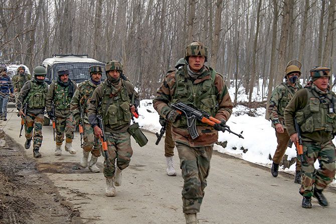 Indian Army soldiers at an encounter in which two soldiers were killed in the Ratnipora area, Pulwama, south Kashmir, February 12, 2019. Photographs: Umar Ganie for Rediff.com