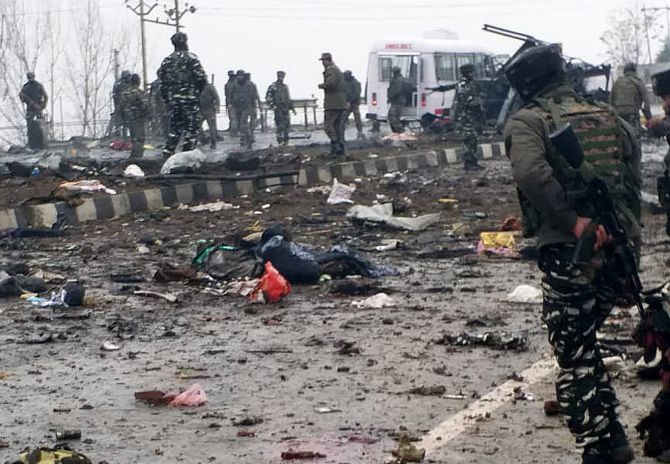 Body parts strewn around the area of the blast in Pulwama