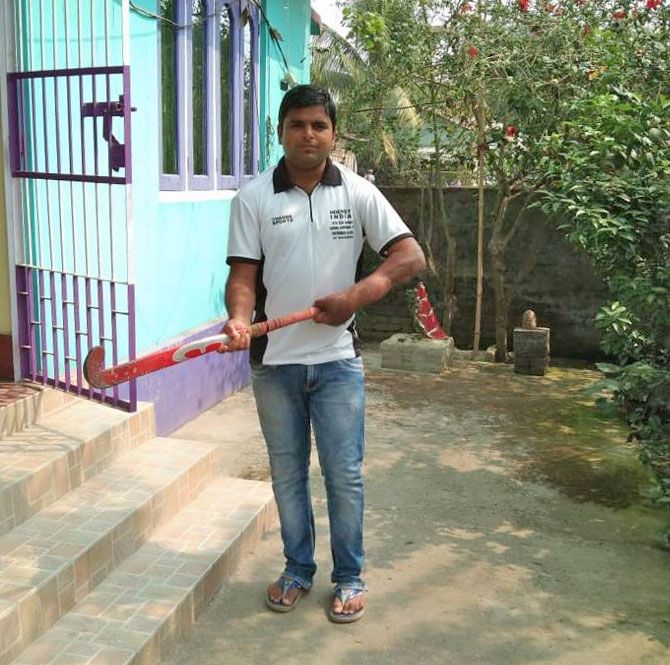 Srikant Chowdhury outside his home in Assam