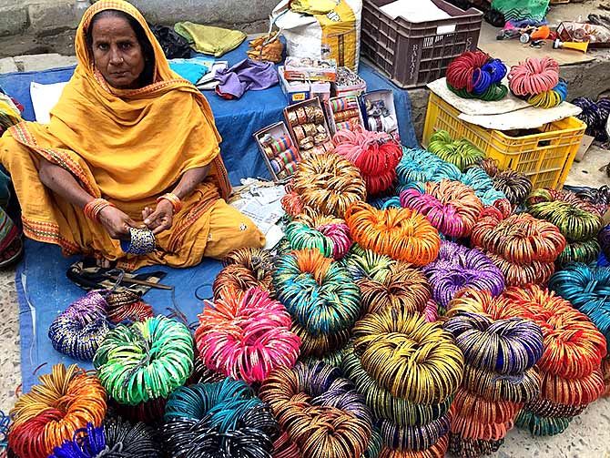 Humza Khatoon sells bangles outside the Peer Baba ki Mazar in Chhapra, Rs 15 per dozen bangles