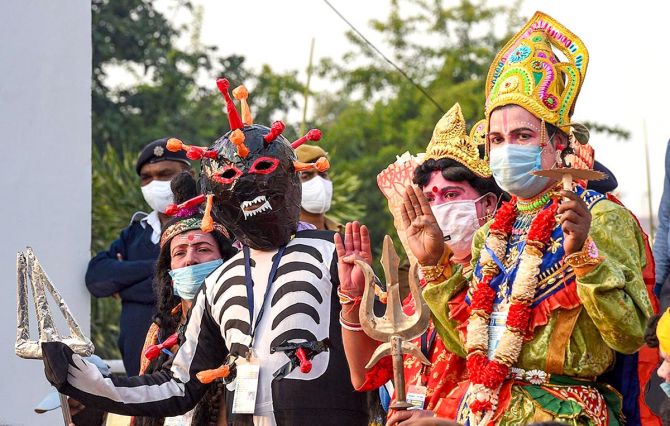 Artists dressed as Hindu deities and depicting the coronavirus during the Bangla Sangeet Mela, inaugurated by West Bengal Chief Minister Mamata Banerjee, in Kolkata, December 23, 2020. Photograph: Ashok Bhaumik/PTI Photo