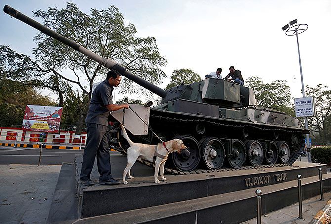 February 18, 2020: The Gujarat police bomb disposal squad scan a tank along the route that United States President Donald J Trump and Prime Minister Narendra Damodardas Modi will take during Trump's visit to Ahmedabad. Photograph: Amit Dave/Reuters