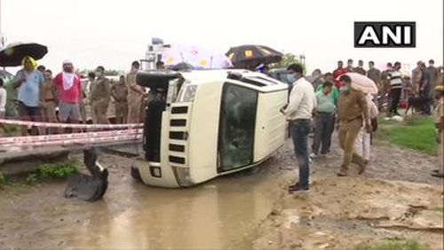 The overturned police vehicle at the site of the encounter