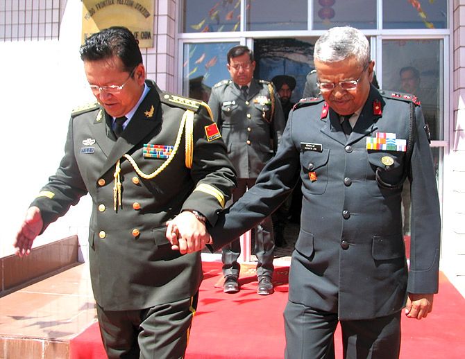 Major Somnath Jha, then the Brigade Commander in Ladakh, with his Chinese counterpart. Photograph: Kind courtesy Major General Somnath Jha