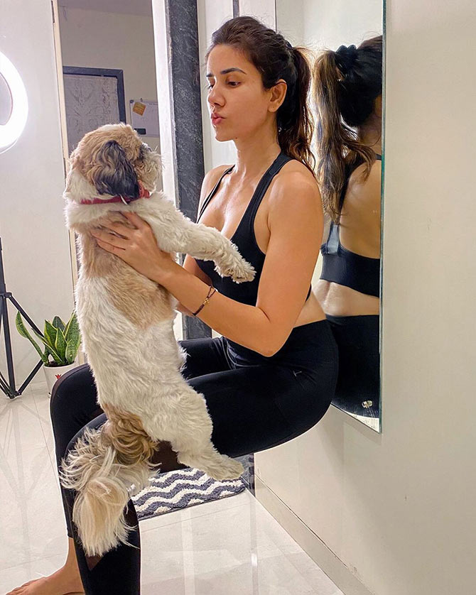 Celebs work out with pets