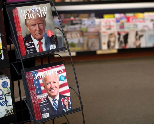 Magazines with Democratic presidential nominee Joe Biden and US President Donald Trump on their covers are pictured in Los Angeles, California.