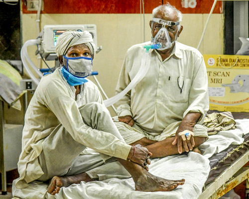 Two patients to a bed as India's healthcare systems fail