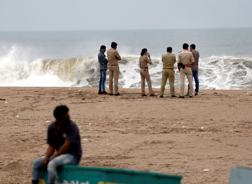 Police man the coastline at Veraval, Gujarat.