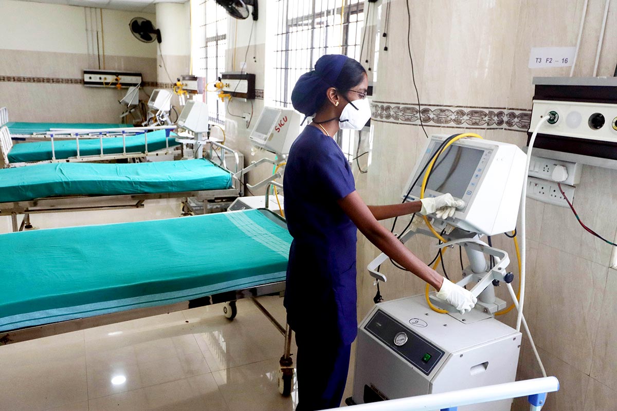 A healthcare worker prepares a Covid ward