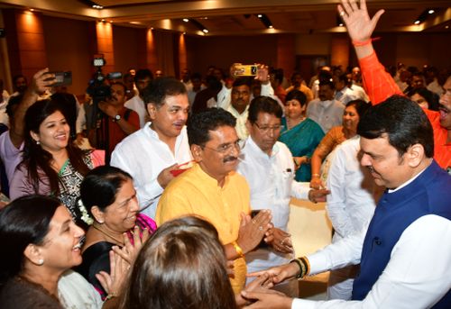 Devendra Fadnavis with with party workers in Mumbai yesterday