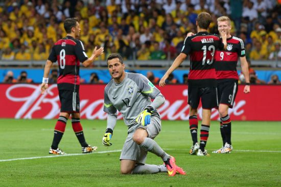 Goalkeeper Julio Cesar of Brazil looks dejected after allowing Germany's sixth goal 