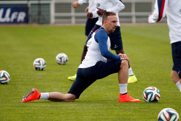 France's national soccer team forward Franck Ribery stretches during a training session in Clairefontaine