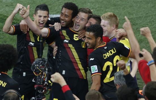 Belgium's Jan Vertonghen (centre) celebrates his goal with team mates